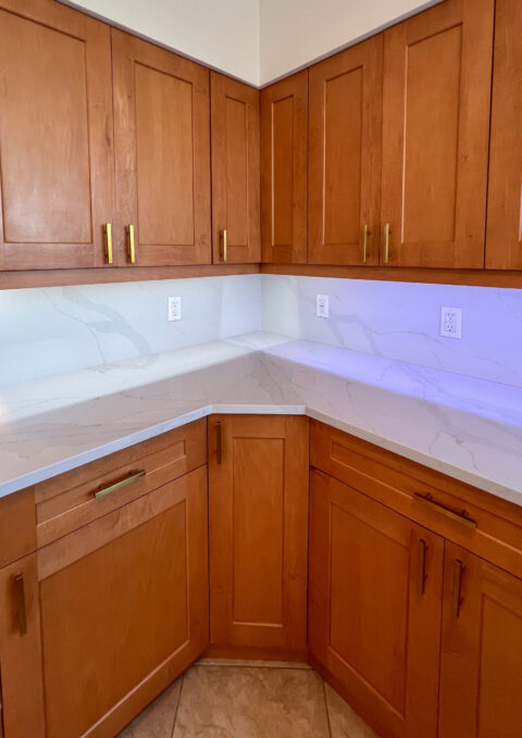 kitchen cabinets showing under cabinet lighting